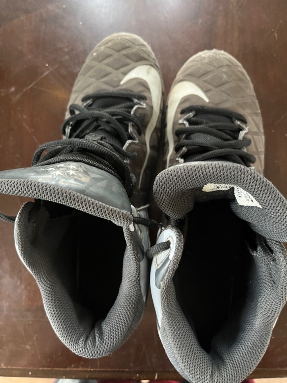 Nike Black and Gray High-Top football cleats